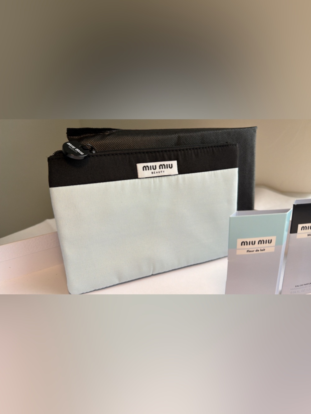 New,authentic Miu Miu beauty collection Cosmetic Bag with 2 samples